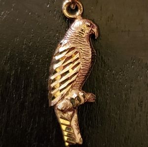 Diamond cut gold parrot necklace